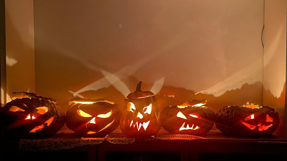 Glowing carved Halloween pumpkins