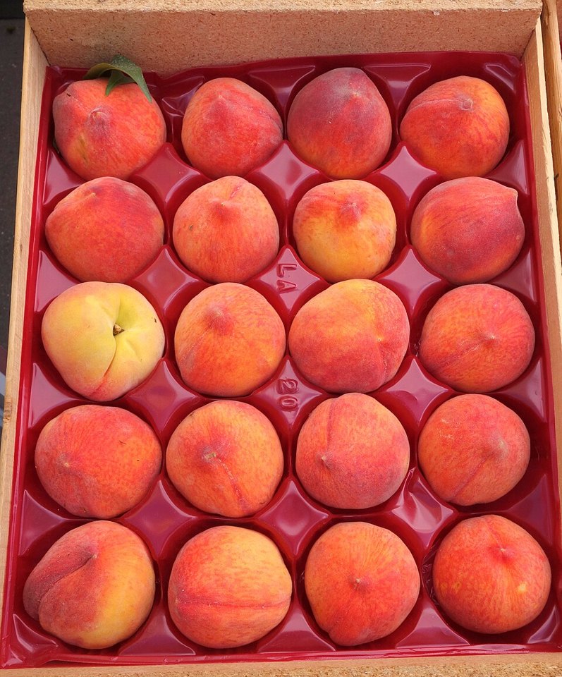 Peaches on a market stall