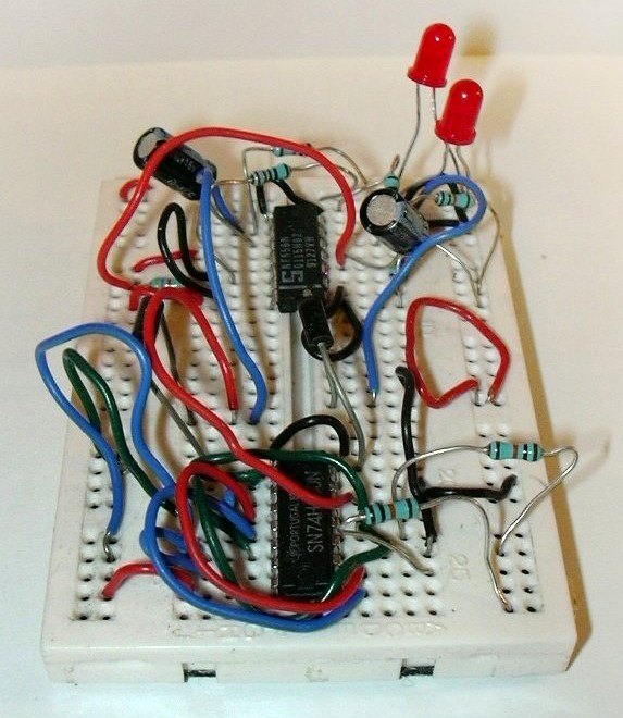 Electronic components and colorful wires on a breadboard